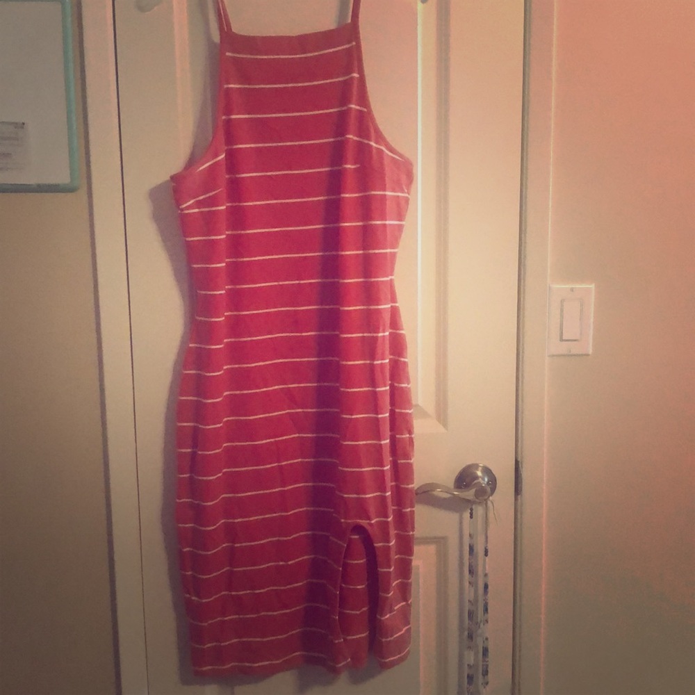Orange striped spaghetti strap dress.